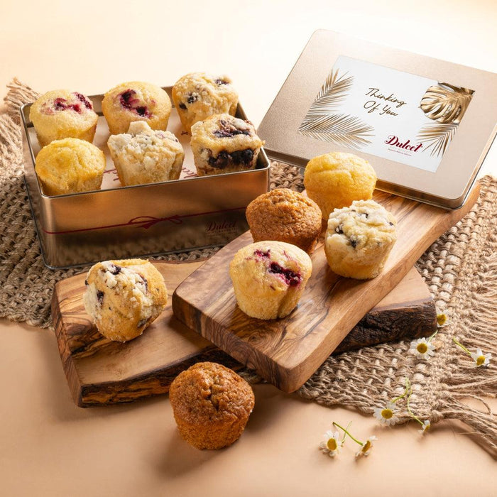 Branded tin of assorted muffins with mixed fruit and crumb tops