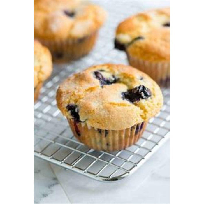 Close-up of blueberry muffin on a metal cooling rack