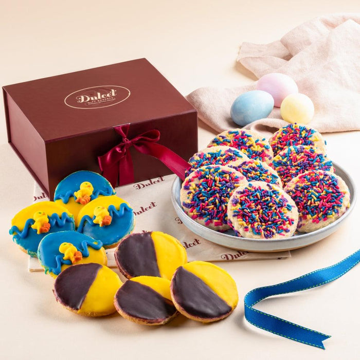 Easter cookie assortment gift box with decorated cookies and blue ribbon bow