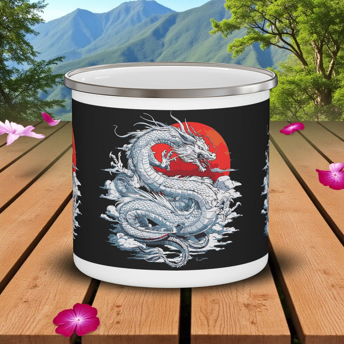 Black enamel camping mug with silver rim; side view of blue-and-red dragon print