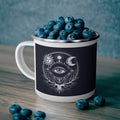 Enamel camping mug filled with blueberries, dark navy with white sacred eye graphic