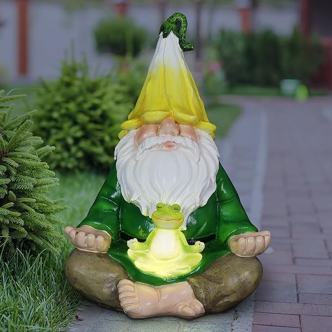 Glowing LED meditating gnome statue with green frog, seated with hands open on a base