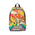 Colorful fabric backpack with front pocket, mushroom and flower graphic print, black trim.