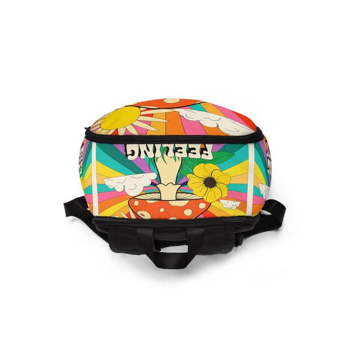 Colorful fabric backpack with top zipper, mushroom and flower graphic print, black base trim.