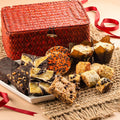 Woven wicker gift box with assorted cookies and brownie pieces