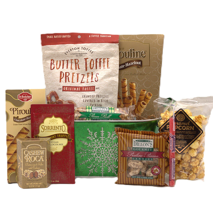 Green Christmas gift basket with assorted gourmet snack packages and treats