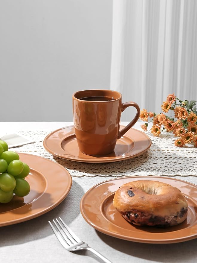 Brown stoneware coffee mug with matching saucer, glossy reactive glaze, upright handle view