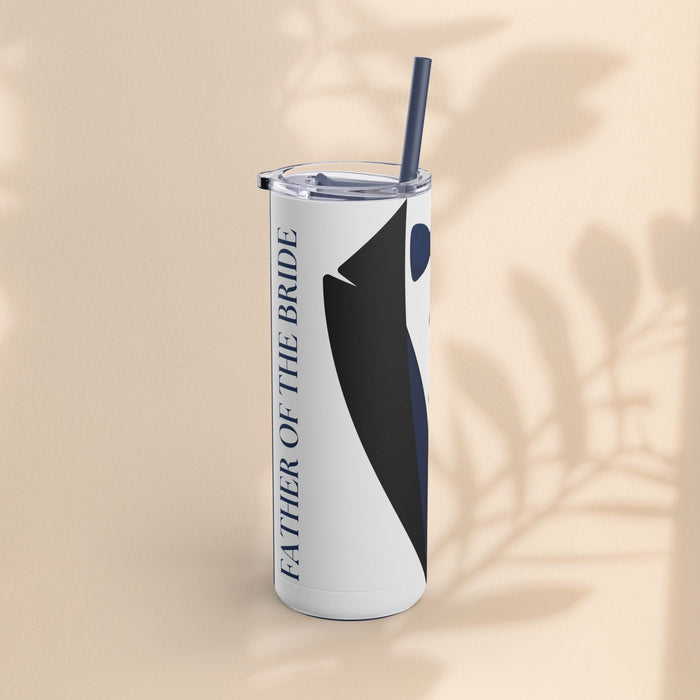 Matte white tumbler with navy tuxedo stripe graphic, clear lid and dark straw