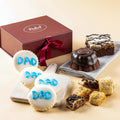 Father's Day sampler gift box with “Dad” cookies and assorted cake squares on tray