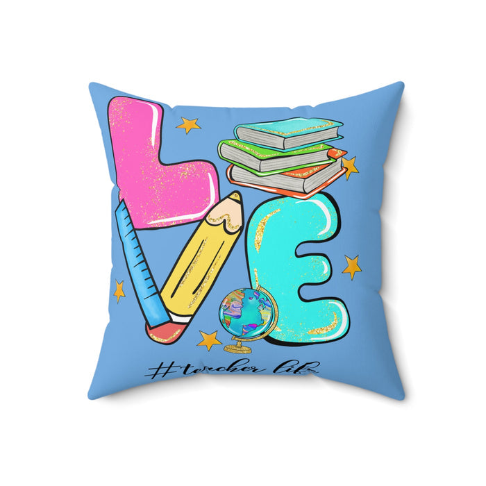 Square faux suede pillow with light blue print: pink teacher figure, books, pencil, globe charm, teal 3