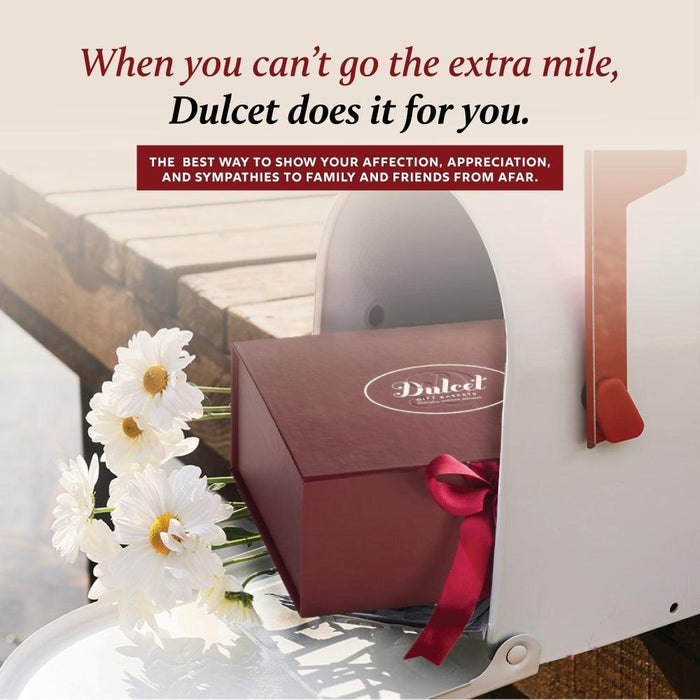Gift box with red ribbon and Dulcet logo on the lid
