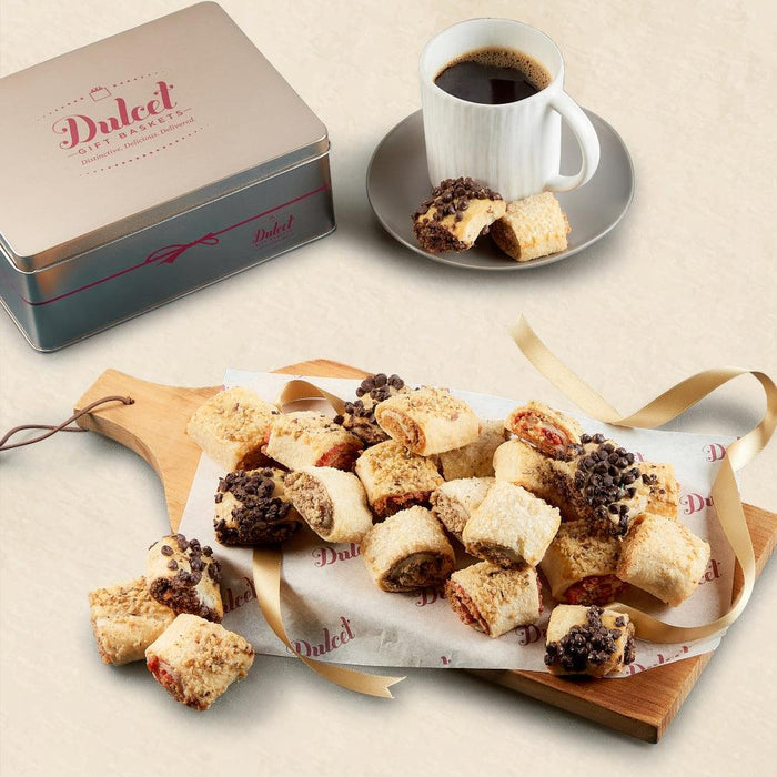 Rugelah gift assortment on wooden tray with ribbon and assorted cookies