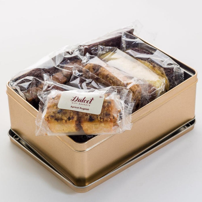 Metal tin of sealed rugelah cookies in clear plastic wrap
