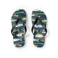 Pair of fish-print flip-flops with black thong straps and blue-green patterned soles