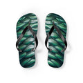 Pair of green merman scales flip flops with black thong straps, side view