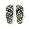 Pair of green flip-flops with white merman scale pattern and black thong straps