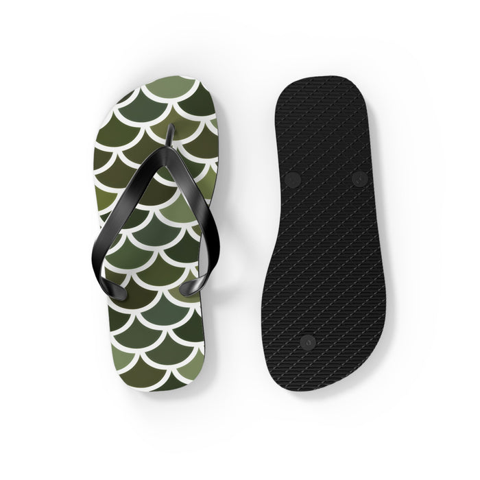 Green flip-flops with white scale pattern and black sole shown separately