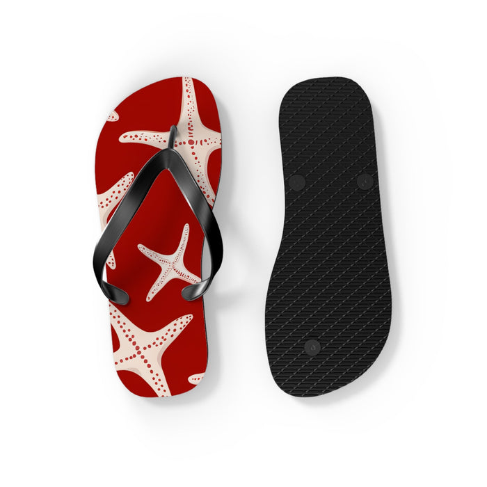 Red starfish flip flop with black thong straps plus black textured outsole