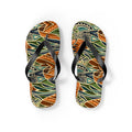 Pair of tribal-pattern flip-flops with black toe-post straps and orange, teal, green prints