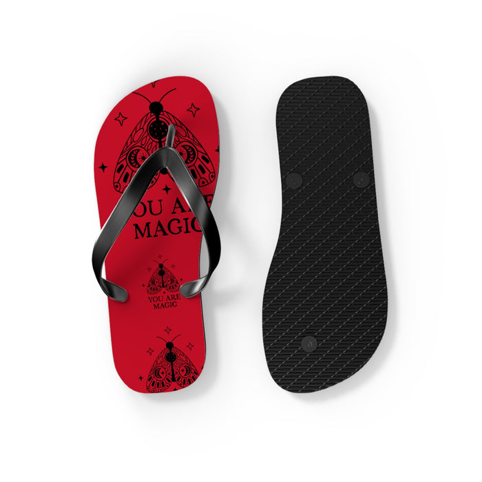 Red flip flops with black strap and textured black outsole