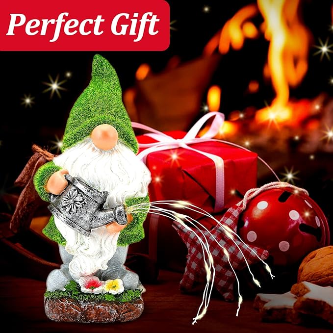 Solar garden gnome statue with green hat and white beard beside red gift box, glowing lights