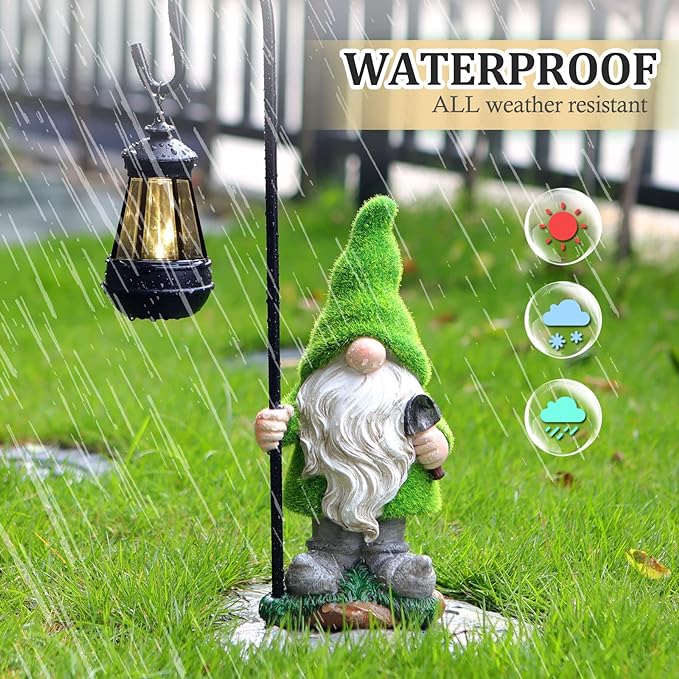 Green gnome solar lantern statue in rain with glowing lantern light for outdoor use