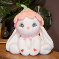 Flower bunny plushie sitting, green ears, blue star eyes, pink bow, and heart accents