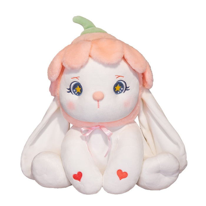 Flower bunny plushie with green ears, blue star eyes, pink bow, and heart accents