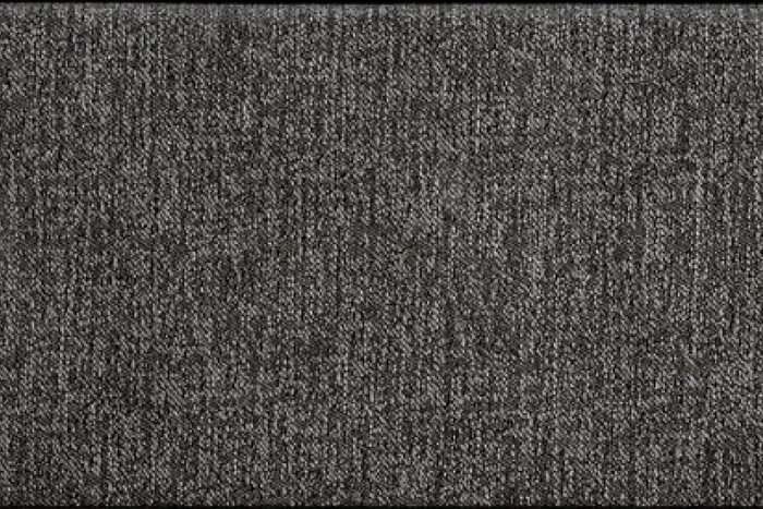 A close-up texture shot of the dark gray woven fabric that comprises Casper's Foundation
