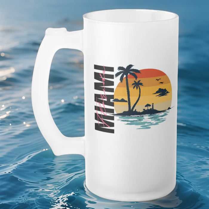Frosted glass beer mug with handle and palm tree sunset graphic on front