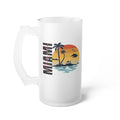 Frosted glass beer mug with handle, palm tree and sunset scene graphic