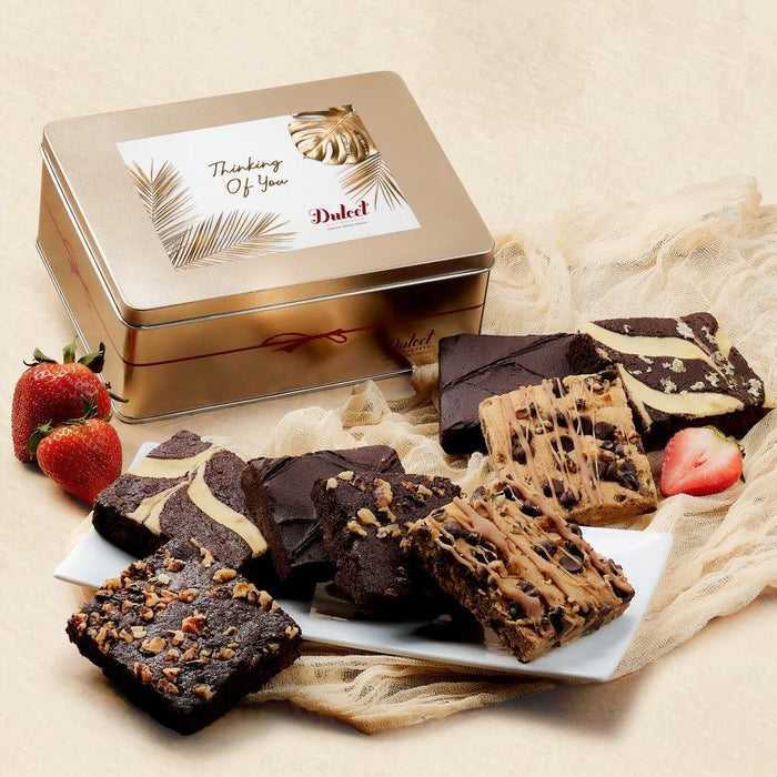 Brown gift tin with assorted brownies and Thinking of You note