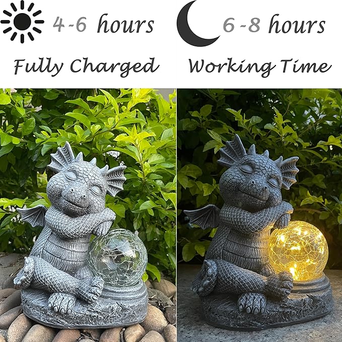 Gray dragon resin figurine holding glowing orb near leaves, outdoor solar decor