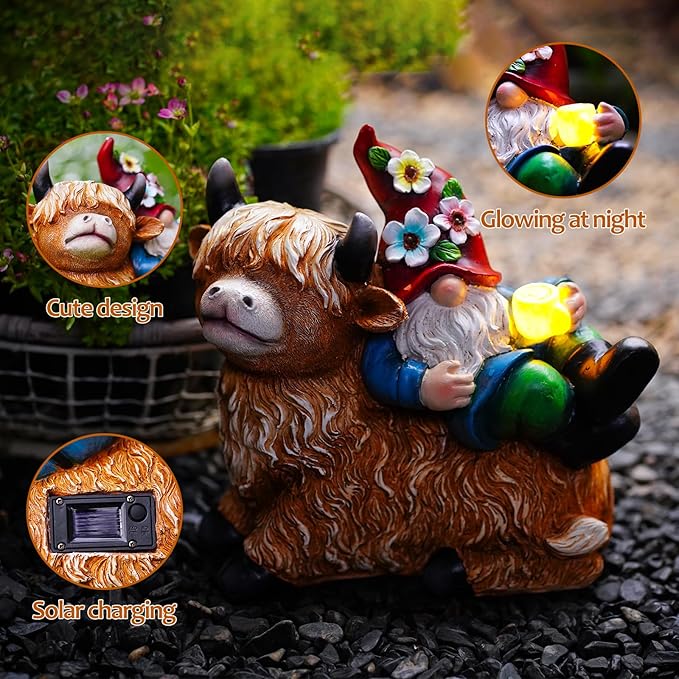 Gnome on highland cow outdoor statue with glowing solar cup light and solar panel