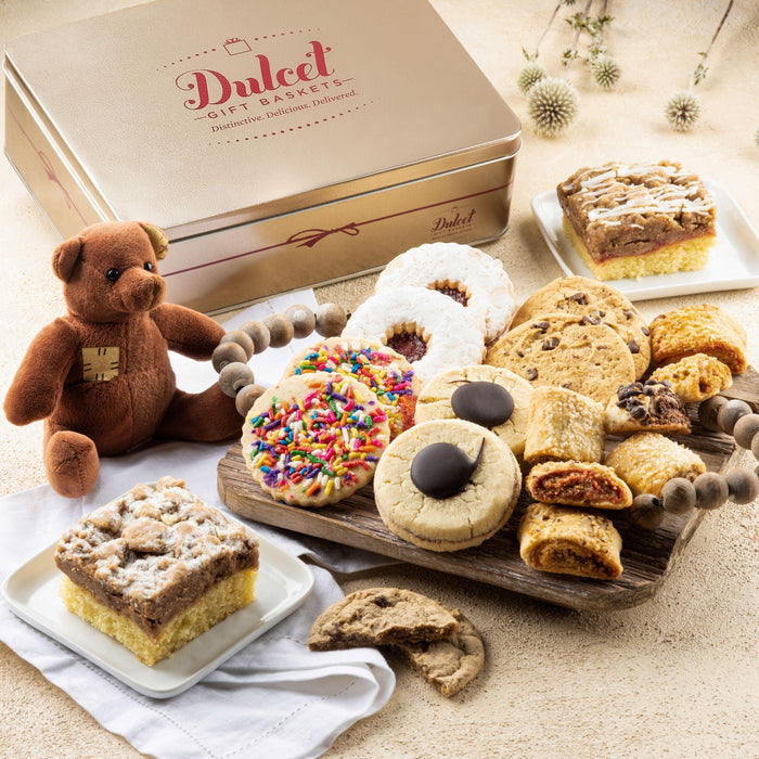 Dulcet gift tin with assorted pastries and cookies, plus a small plush teddy bear