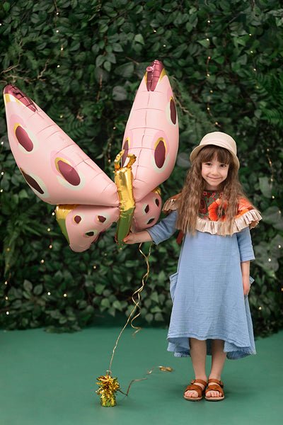 Pink butterfly foil balloon with gold center and multicolor oval spots.