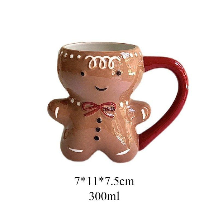 Gingerbread man mug with brown cookie body, white icing dots, and red handle