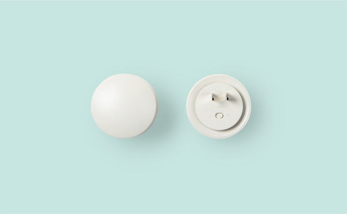Image of two Glow Nightlights, one from the front and the other from behind.