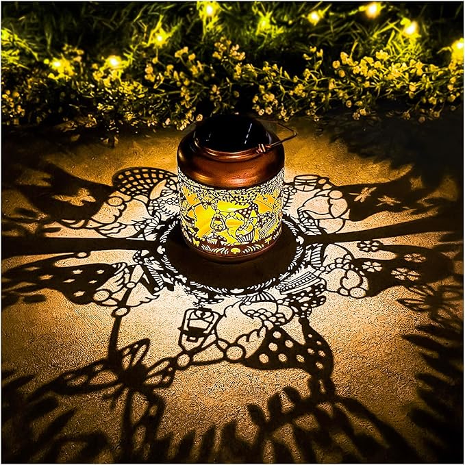 Copper solar lantern with cutout gnome design, warm LED glow on ground