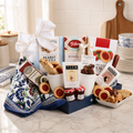 Breakfast tray gift basket with blue tray, floral cloth, cups, and assorted snack packages