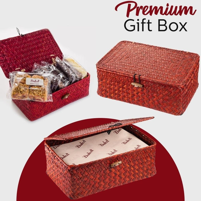Woven wicker gift boxes with handles, one open with wrapped pastries