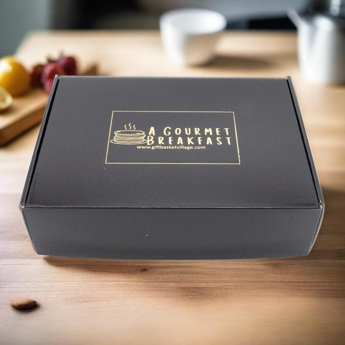 Black gourmet breakfast gift box with gold logo on front