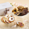 Dulcet cookie and brownie gift box with assorted cookies on white plate