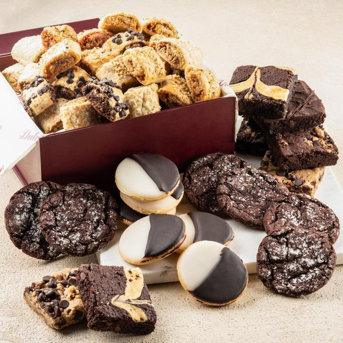 Bakery gift box with assorted cookies and brownies, including dark and white-topped pieces