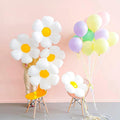 White daisy foil balloon cluster with yellow center and hanging string, 28 inch