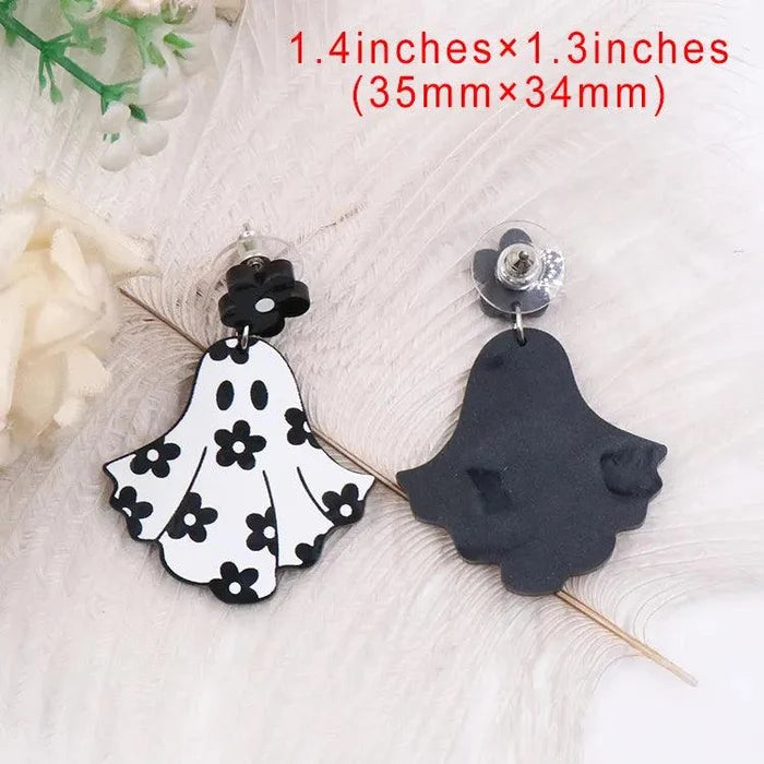 Ghost earrings: white ghost charm with black flower print and matching black backing