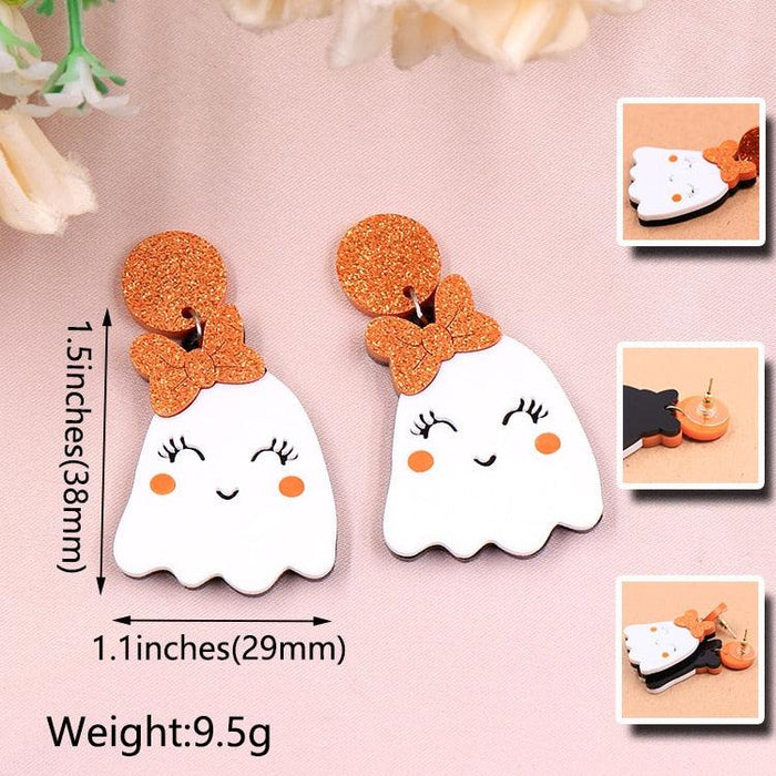 Set of two ghost face earrings with orange glitter hair and white smiling faces