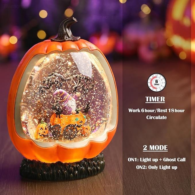 Orange pumpkin snow globe with swirling glitter and built-in timer feature
