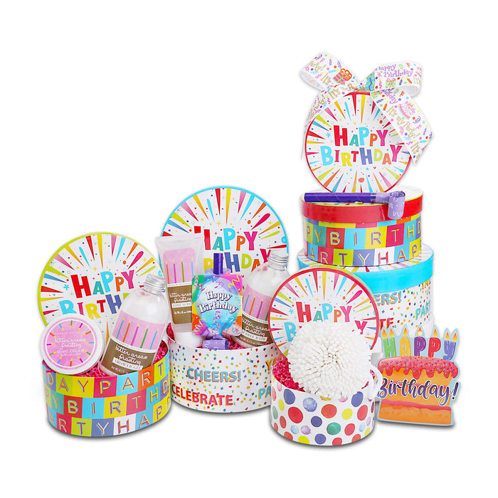 Happy Birthday spa gift tower with stacked tubs, shower balls, and round balloon sign