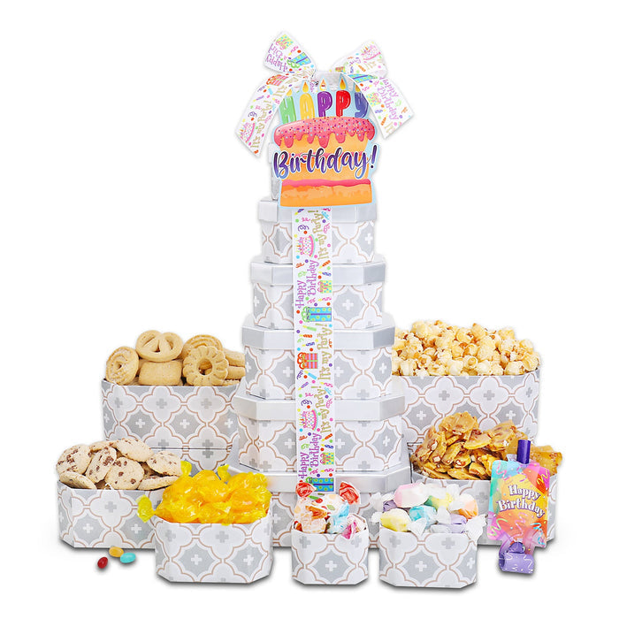Birthday treat gift tower with stacked gray patterned boxes and Happy Birthday topper
